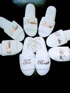 white slippers with bride and groom written on them are arranged in the shape of a flower