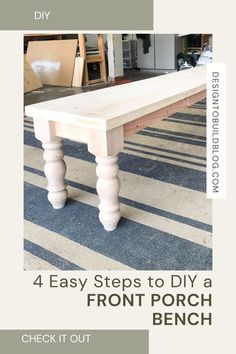 a wooden bench sitting on top of a blue and white rug