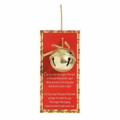 a christmas ornament with a bell on it's side and a poem written below