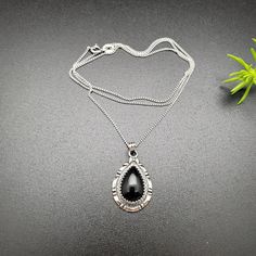 Visit our on-line shop at: Etsy.com/shop/AlbuquerqueDesigns *sterling silver necklace pendant *big pear shape pendant with silver box chain necklace 18 inches long *southwestern jewelry *black onyx / black stone *calibrated pre-cut stones in millimeter and shape of stone: 15x10mm teardrop shape *back of jewelry items are all covered / do not show the back of stones *all jewelry items are made to ship, slight variations in stones will occur comparing to pictures. *size of a penny is 19mm or a dim Sterling Silver Necklace With Large Black Pendant, Black Sterling Silver Necklace With Large Pendant, Silver Onyx Pendant Necklace, Black Necklace With Silver Chain And Round Pendant, Black Jewelry With Silver Chain And Round Pendant, Silver Onyx Oval Pendant Necklace, Black Sterling Silver Teardrop Pendant Jewelry, Black Sterling Silver Jewelry With Teardrop Pendant, Black 925 Stamped Pendant Jewelry