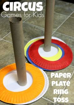 paper plate ring tossers on the ground with text overlay reading circus games for kids