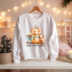 Ideal for any situation, these Just a Girl Who Loves Fall with a plaid pumpkin and boots and a pumpkin spice latte on a heavy blend, crewneck, women's (unisex) sweatshirt are pure comfort. These garments are made from polyester and cotton which helps the designs come out looking fresh and beautiful. The collar is ribbed knit, so it retains its shape even after washing. There are no itchy side seams on these sweatshirts.  A soft and comfy Autumn pullover sweatshirt gift for any mother or your significant other that is sure to please!    **PLEASE SCROLL FURTHER FOR SIZING** COLOR OPTIONS: White, Ash, Sand **Please see pdf Color Chart provided in the images section that displays all color options available for this shirt, but not necessarily for this specific design.  (I can make any of these Plaid Cotton Sweatshirt For Fall, Cute Plaid Tops For Fall, Plaid Pumpkin, Autumn Sweater, White Ash, Fall Clothing, Sweatshirt Cute, Cozy Autumn, Sweater Gift