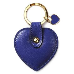 a blue leather heart shaped keychain with a gold metal ring on it's side