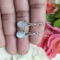 NOTE : WE USED NATURAL GEMSTONES , SO STONE MAY BE LITTLE DIFFERENT .Here is a listing of Rainbow Moonstone Stone 925-Sterling Silver Earrings About Product :- # Title - Silver Boho Earrings # Material - Sterling Silver 925 # Stone - Rainbow Moonstone # Shape - Oval it will look very beautiful when you wear in party and special occasion .. It is A special gift for your loved once ... Note -Please see all images for more details . Thanks for visiting our shop. Favorite our shop for daily updates White Oval Moonstone Earrings, Oval Moonstone Earrings For Gift, Handmade Oval Moonstone Earrings, Red Crystal Ring, Bezel Jewelry, Chalcedony Ring, Moonstone Stone, Handmade Earring, Bohemian Rings