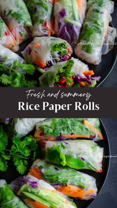 rice paper rolls with lettuce and carrots in them on a black plate