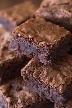 chocolate brownies stacked on top of each other