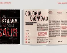 an open book with red and black lettering on the front cover, inside pages spread out