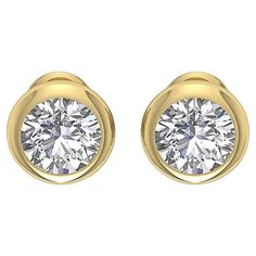 Style: Bezel-Set Solitaire Studs Metal: Yellow Gold Metal Purity: 18k Stones: 2 Round Diamonds Diamond Carat Weight: approx. 0.25 ct each (0.5ct total) Diamond Clarity: VS1 - VS2 Diamond Color: G - H Total Weight (grams): 1.0 Earring Back: Standard push back post Includes: Brilliance Jewels 2 Year Warranty Brilliance Jewels Packaging, Appraisal upon request Gold Round Diamond Earrings Channel Set, Gold Round Channel Set Diamond Earrings, Formal 14k Gold Diamond Earrings Channel Set, Gold Round Cut Channel Set Diamond Earrings, Gold Channel Set Round Cut Diamond Earrings, Gold Diamond Earrings Channel Set Round Cut, Formal 14k Gold Channel Set Diamond Earrings, Gold Diamond Earrings With Bezel Setting For Anniversary, Formal Gold Diamond Earrings With Single Diamond