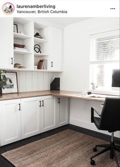 a home office with white cabinets and black chair in front of the desk is an area rug