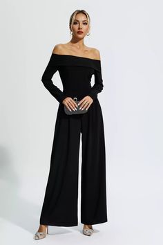 Stand out on any special occasion in the Cassidy Black Off Shoulder Drape Jumpsuit. This stunning piece is made from comfortable fabric and cut in a flattering off-the-shoulder silhouette. Cross-strap detail at the back adds a touch of chic to the look. This piece is guaranteed to keep you looking and feeling your best. Complete the look with heels!  Length: Approx 136cm Materials: Polyester Gentle Dry Clean Only  Model is 5 ft 7 and wears size S  Colour may vary due to lighting on images. The p Off Shoulder Pantsuit, Black Jumpsuit Outfit Night Classy Party, Formal Dinner Outfit Classy Night, Orchestra Concert Outfit, Black Jumpsuit Outfit Night Classy, Black Jumpsuit Formal, Black Tie Jumpsuit, Sydnie Christmas, Prom Pantsuit