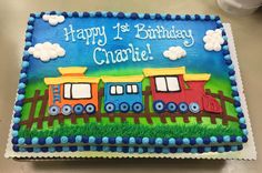 a birthday cake with a train on it