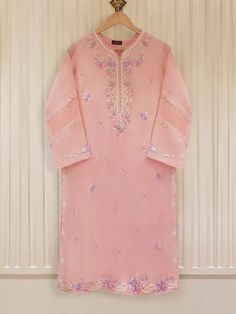 "2 Piece - Kurta and Pant 100% Pure Cotton Net Heavly Embroidered Shirt  100% Pure Raw Silk Pants Kurta Length 46 Inch Peach Color Small Chest: 39\" Medium Chest: 42\" Large Chest: 45\" No Return or Exchange Pleace contact me for any questions regarding product. If you need specific measurements or other pics please contact us by message. Disclaimer Dry clean recommended. Iron the clothes at moderate temperature. Do not use any type of bleach or stain removing chemicals. Actual color may slightly vary from the image shown." Pink Embroidered Festive Pants, Festive Pink Embroidered Pants, Festive Embroidered Pink Pants, Pink Chikankari Embroidery Pants For Eid, Festive Pink Cotton Pants, Elegant Pink Pants For Eid, Pink Fitted Traditional Pants, Fitted Embroidered Pink Pants, Fitted Pink Embroidered Pants