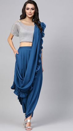 Traditional Ruffled Dupatta For Navratri, Traditional Draped Sets With Ruffles, Bollywood Style Ruffled Dupatta For Navratri, Blue Choli With Ruffles And Traditional Drape, Navratri Ruffled Pre-draped Saree, Navratri Ruffled Choli With Traditional Drape, Blue Lehenga With Ruffles And Traditional Drape, Blue Ruffled Pre-draped Traditional Saree, Traditional Blue Pre-draped Saree With Ruffles