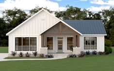 a small white house with two windows and a gray metal roof is shown in front of some trees