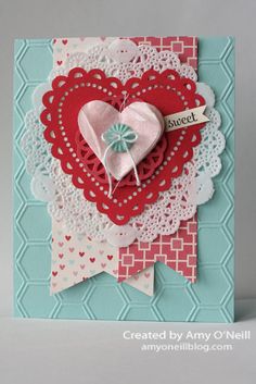 a close up of a card with a heart on it