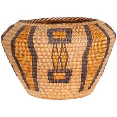 a woven basket with the letter l on it's front and bottom, in yellow and black