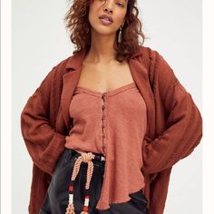 Flowy Button-Front Silhouette With Lettuce Bottom Hemline. Brown Buttoned Beach Tops, Brown Beach Tops With Buttons, Brown Buttoned Tops For Beach, Brown Buttoned Tops For The Beach, Brown Button-up Beach Top, Button-up Beach Tops For Fall, Brown Beach Tops With Button Closure, Brown Beach Top With Button Closure, Brown Button Closure Top For Beach