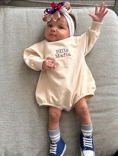 Buffalo Bills Baby | Buffalo Bills Toddler | Buffalo Bills | NFL Baby | Football Baby | Buffalo New York | New York | Sports Baby | East Coast | Bills Mafia Want your baby to not only look stylish and cool but feel super comfortable? These oversized baby sweatshirts are the perfect find! Made with 95% organic cotton and 5% spandex, these bubble romper sweatshirt onesies are the cream of the crop. We now carry TODDLER sizes! Sizes 2T, 3T and 4T DO NOT have buttons. To all my NFL fans, but more specifically, my Buffalo Bills fans! Bills Mafia! Buffalo, Baby! Taking baby to their first NFL game or cheering for your favorite team in the comfort of your own home? This sweatshirt is for you!  Our gender-neutral colors allow for both baby girls and baby boys to look and feel their absolute best! Casual Cream Onesie For Playwear, Casual Cream Onesie For Playtime, Cream Casual Onesie For Playtime, First Birthday Cotton Romper In Cream, Buffalo Bills Baby, Baby Football, Diaper Party, Baby Buffalo, Bills Mafia