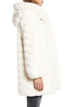 This faux-fur coat features a uniquely grooved texture that lends itself to a stunning A-line silhouette that won't let you down when the weather drops. 100% polyester faux fur Dry clean Imported Unique Formal Dresses, Fur Hooded Jacket, Faux Fur Hooded Jacket, Fur Hood Coat, Street Style Winter, Let You Down, White Coat, Fur Hood, Faux Fur Coat