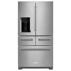 a silver refrigerator freezer sitting inside of a kitchen