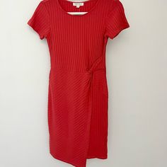 Ultra Flirt Red Plisse Ribbed Mini Dress. Baked Candy Apple Daytime Red. Short Sleeves. Front Knot Detail. Asymmetrical Hemline. Fitted, Bodycon Style. Faux Wrap Skirt. Nwt Never Worn, No Flaws. Size Small Approximate Measurements... Pit To Pit Lying Flat: 13” Waist: 12” Length: 34” Flirty Cute Casual Chic Summer Vacation Travel Winery Basic Preppy Business Interview Essential Red Ribbed Mini Dress Spring Red Midi Dress With Asymmetrical Hem, Red Asymmetrical Mini Dress For Spring, Fitted Ribbed Red Dresses, Casual Red Rayon Mini Dress, Red Ribbed Fitted Midi Dress, Red Ribbed Mini Dress, Flirty Red A-line Mini Dress, Red Stretch Ribbed Mini Dress, Red Ribbed Knee-length Dress