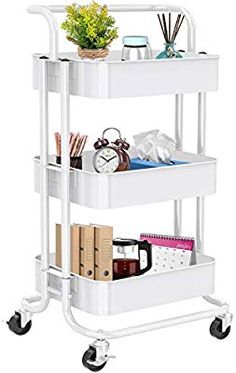 three tiered cart with books and office supplies