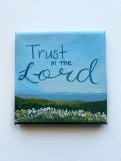 a painting that says trust in the lord