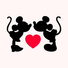 mickey and minnie mouse silhouettes with a heart