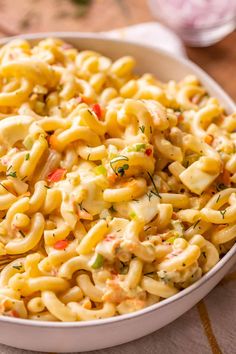 a white bowl filled with macaroni and cheese