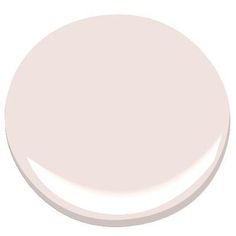 a white paint color with a light pink hue