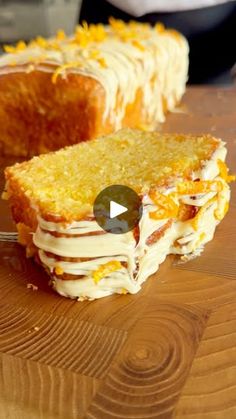 a piece of cake sitting on top of a wooden cutting board