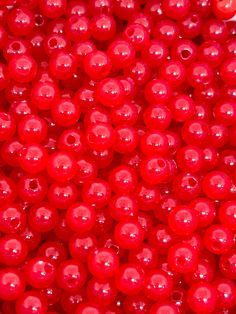 red beads are shown in this close up photo