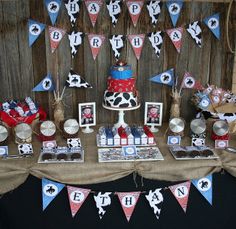 a birthday party set up with cow theme