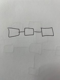 a piece of paper that has been drawn on to it with squares and rectangles