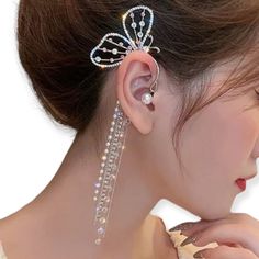 Indulge In The Ultimate Statement Piece With These Butterfly Wing Ear Cuff Tassel Earrings. Boasting Shimmering Butterfly Wings And Vibrant Crystals, These Earrings Exude Luxury While Remaining Affordable. Let Your Inner Beauty Shine As You Glisten And Radiate Charm. The Delicate Silver Tassels, Dazzling Crystals And Elegant Cascading Chains Add A Touch Of Glamour To Your Look. Transform Into A Graceful Butterfly And Soar To New Heights Of Style And Sophistication. One Per Order Total Length 6" Wing Ear Cuff, Dark Earrings, Ear Cuff Earrings, Tassel Earing, Red Heart Earrings, Crystal Heart Earrings, Long Tassel Earrings, Silver Post Earrings, Silver Ear Cuff