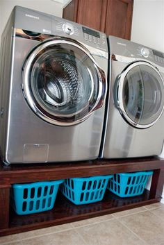 a washer and dryer stacked on top of each other in a laundry room