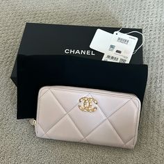 Chanel 19 Ling Wallet In Beautiful Light Color. Official Color Is Light Purple But It Almost Look Like A Light Rose. Never Been Used And Have All The Original Packaging Including The Box, The Ribbon And Dust Bag. Have Authenticity Card As Well. Luxury Evening Wallet With Zipper Closure, Luxury Rectangular Wallet With Zipper Closure, Luxury Rectangular Wallets With Zipper Closure, Designer Evening Wallet With Zipper Closure, Light Purple Color, Chanel 19, Chanel Wallet, Light Rose, Rose Lights