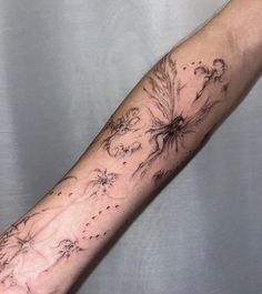 a person with a tattoo on their arm