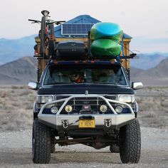 a truck with an array of items on the roof