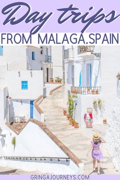 a woman in a purple dress and hat is walking down the street with text overlay that reads day trips from malaga spain