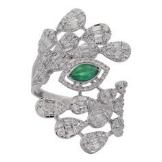 an emerald and diamond ring, by van cleef