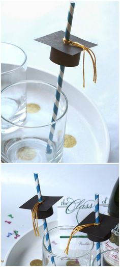 graduation decorations made out of paper straws are displayed on a white plate with blue and gold stripes