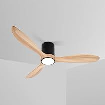 a ceiling fan with wooden blades and black light fixture in a white walled room,