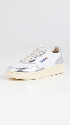 Fast Free Shipping & Free Returns on Autry Medalist Sneakers at Shopbop. Shop new arrivals from Autry at Shopbop.com Classic Silver Sneakers With Perforated Toe Box, Leather Sneakers With Perforations And Closed Toe, Silver Leather Sneakers With Flat Heel, Silver Leather Flat Heel Sneakers, Mom Style Fall, Autry Sneakers, Metallic Sneakers, Latest Sneakers, Medical Problems