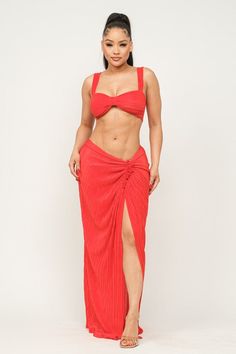 This Orange Side Detail Maxi Skirt Set is an excellent choice for a special occasion. Crafted with a beautiful, flowing skirt and a fitted top, this eye-catching set is sure to make a statement. The vibrant orange details are sure to be a conversation starter. The skirt has a maxi length and an elastic waistband, making it ultra-comfortable for all-day wear. Fabric & fit: 100% Polyester Model is wearing size Small. Fitted Maxi Skirt Set For Spring, Fitted Maxi Length Skirt Set For Spring, Spring Fitted Maxi Skirt Set, Flowy Skirt Set For Summer Party, Summer Party Flowy Skirt Set, Elegant Long Skirt Set For Summer, Summer Party Long Skirt Set, Fitted Maxi Length Skirt Set For Party, Chic Ruched Maxi Skirt For Party