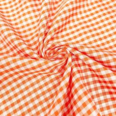 an orange and white checkered fabric