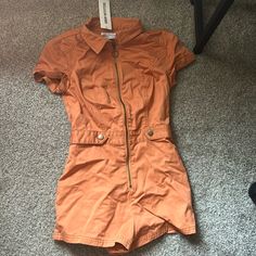 Never Worn New With Tags Orange Jumpsuit Form Fitting Size Extra Small Breathable Material I’m Obsessed With This Jumpsuit. It Just Does Not Fit Me And I Never Had A Chance To Return. Urban Outfitters Jumpsuit, Suspender Jumpsuit, Never Had A Chance, Orange Jumpsuit, Urban Outfitters Pants, Color Orange, Pant Jumpsuit, Urban Outfitters, Pants For Women