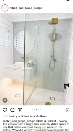 a bathroom with a walk in shower next to a white sink and mirror on the wall