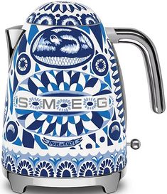 a blue and white toaster with the words smeg on it