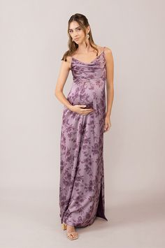 a pregnant woman in a purple dress